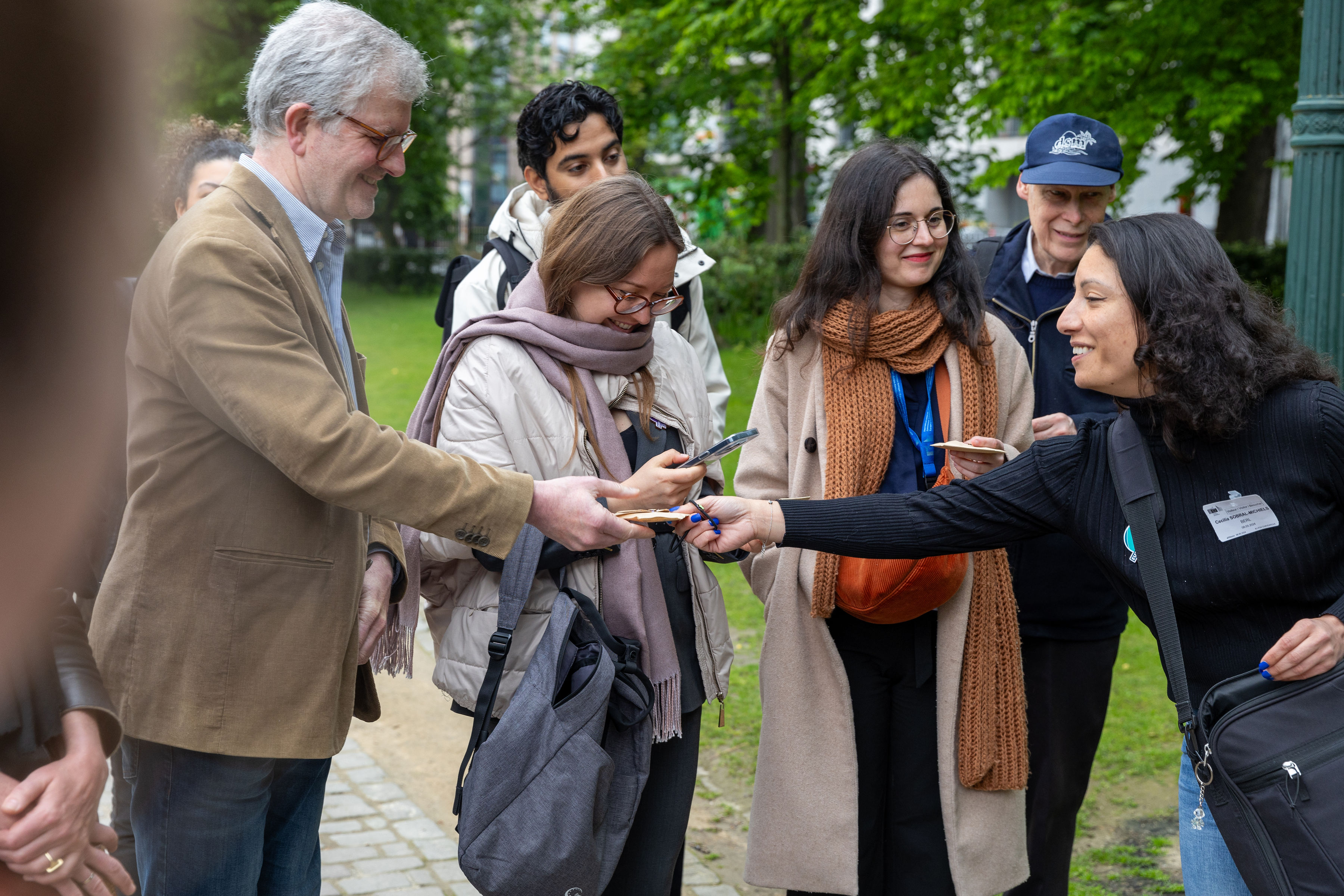 Pact Ambassador Cecilia Sobral handed out flower seeds to participants after telling them about the Green Sparks project, Brussels, 8 May 2024.