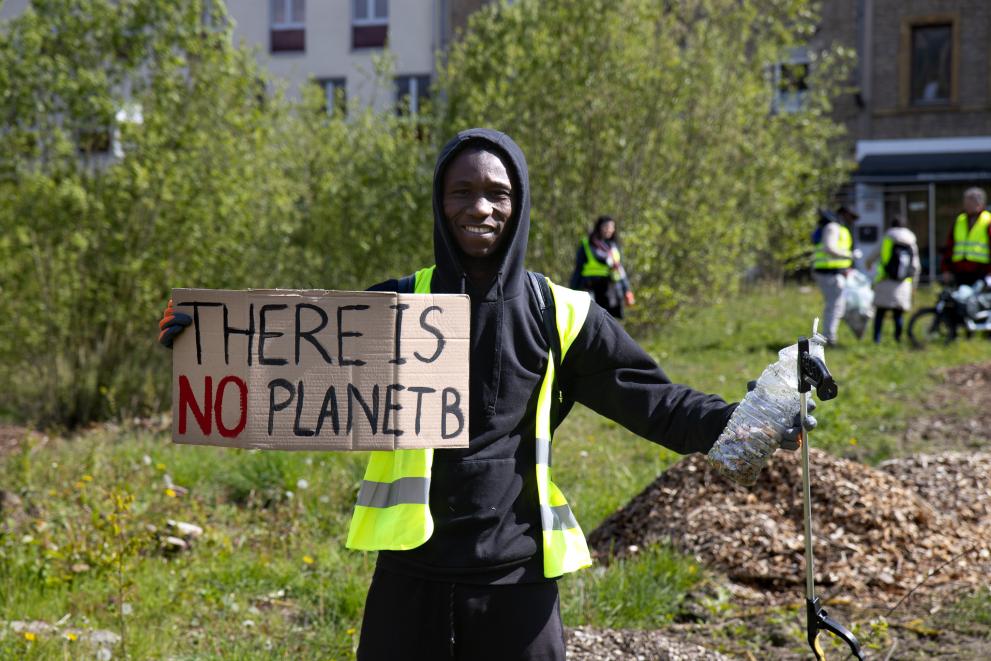 Participant of a clean-up organised by Ambassador César González Fernández’s NGO Clean Something for Nothing, Luxembourg, 22 April 2024.